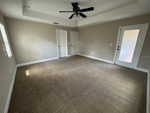 18805 Nettleton St, Orlando, FL 32833 - spare room with a raised ceiling, plenty of natural light, and baseboards