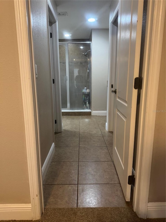 18805 Nettleton St, Orlando, FL 32833 - corridor featuring baseboards and tile patterned floors