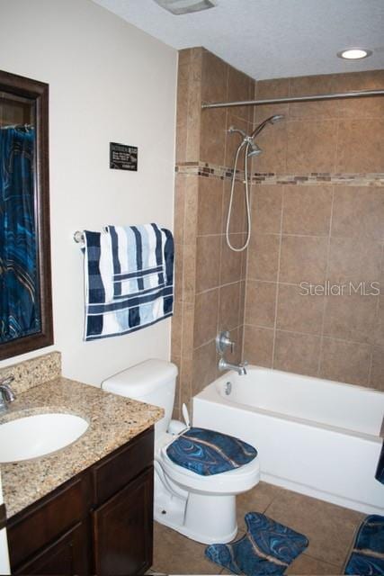 18805 Nettleton St, Orlando, FL 32833 - full bath featuring vanity, tile patterned floors, toilet, and bathing tub / shower combination