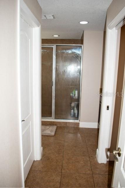 18805 Nettleton St, Orlando, FL 32833 - hallway with tile patterned floors and baseboards