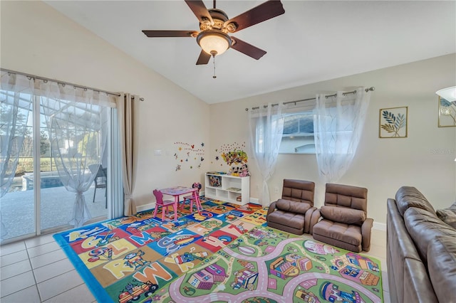 620 Old Bridge Cir, Davenport, FL 33897 - rec room with lofted ceiling, plenty of natural light, ceiling fan, tile patterned flooring, and baseboards