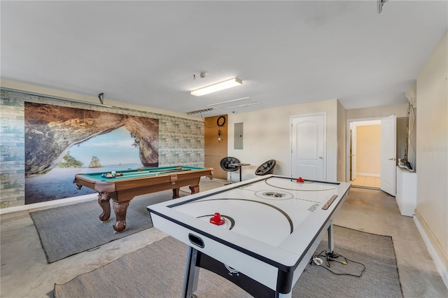620 Old Bridge Cir, Davenport, FL 33897 - playroom featuring concrete flooring, electric panel, billiards table, and baseboards