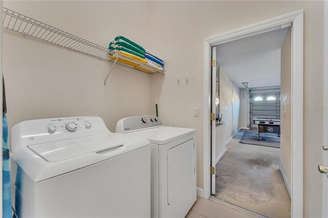 620 Old Bridge Cir, Davenport, FL 33897 - washroom featuring separate washer and dryer and baseboards