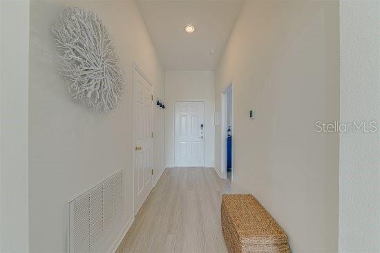 926 Balmoral Dr, Davenport, FL 33896 - corridor featuring light wood-style floors and recessed lighting