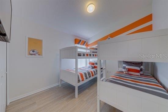 926 Balmoral Dr, Davenport, FL 33896 - bedroom featuring light wood-style floors