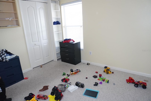 10308 Soaring Eagle Dr, Riverview, FL 33578 - game room with baseboards and carpet