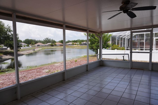 10308 Soaring Eagle Dr, Riverview, FL 33578 - unfurnished sunroom featuring a ceiling fan and a water view