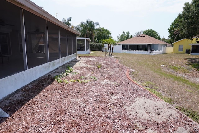 10308 Soaring Eagle Dr, Riverview, FL 33578 - view of yard with a sunroom and a ceiling fan