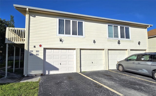 1024 Spring Meadow Dr, Kissimmee, FL 34741 - view of property exterior featuring an attached garage