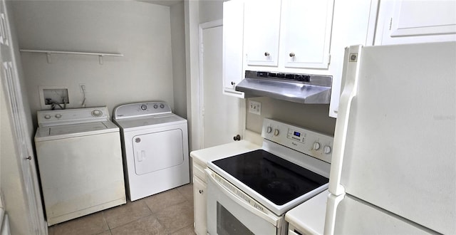 1024 Spring Meadow Dr, Kissimmee, FL 34741 - washroom with washer and clothes dryer and light tile patterned floors