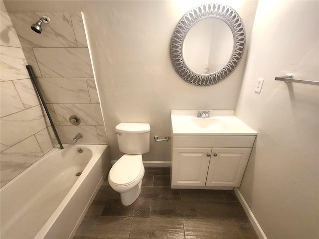 1024 Spring Meadow Dr, Kissimmee, FL 34741 - bathroom with vanity, toilet, shower / washtub combination, and baseboards