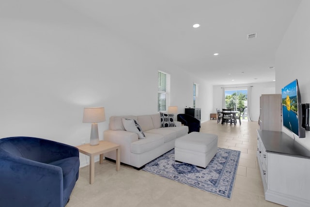 living area with recessed lighting