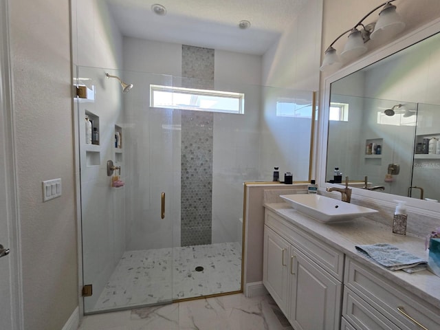 8270 Topsail Pl, Winter Garden, FL 34787 - bathroom featuring a shower stall, vanity, and marble finish flooring