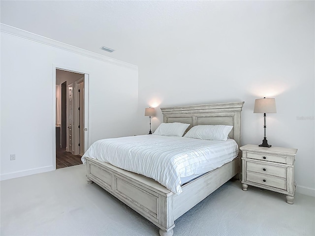 bedroom featuring carpet floors and baseboards