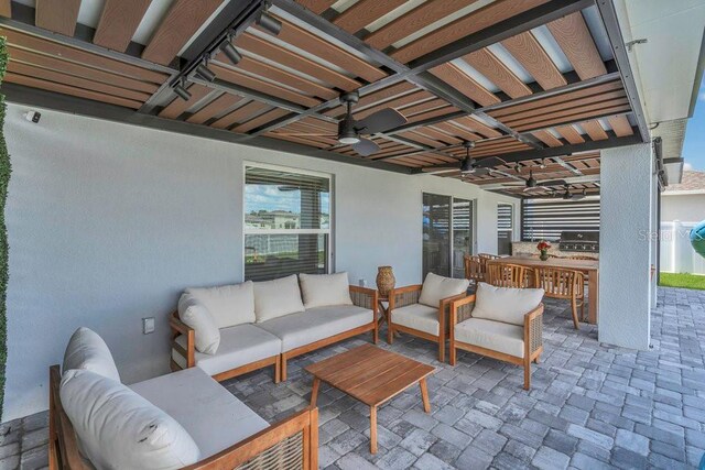 374 Pine Tree Bridge Trl, Saint Cloud, FL 34772 - view of patio with ceiling fan, an outdoor hangout area, and area for grilling