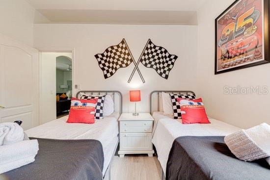 bedroom featuring wood finished floors