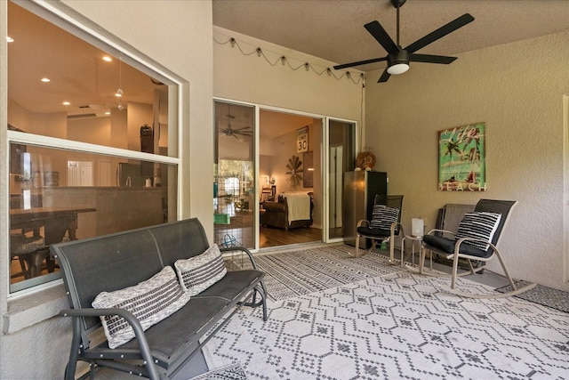 view of patio featuring ceiling fan