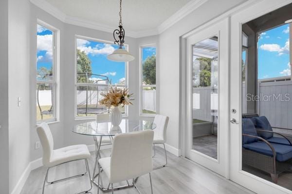 721 Hardwood Cir, Orlando, FL 32828 - sunroom / solarium with french doors and healthy amount of natural light