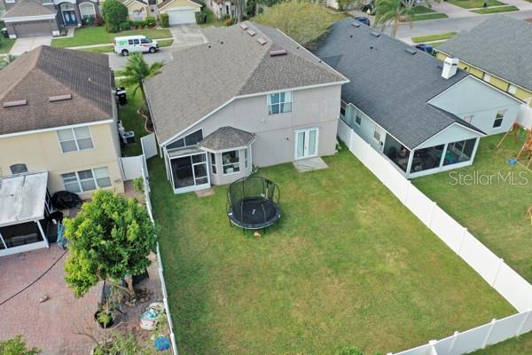 721 Hardwood Cir, Orlando, FL 32828 - aerial perspective of suburban area