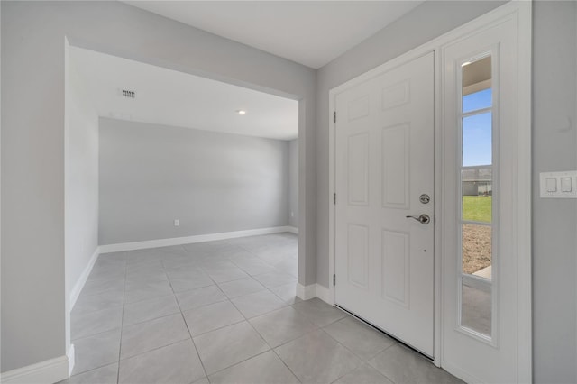 502 Viceroy Ct, Kissimmee, FL 34758 - entrance foyer featuring baseboards and light tile patterned floors