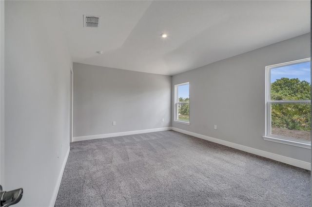 502 Viceroy Ct, Kissimmee, FL 34758 - spare room featuring carpet, baseboards, and recessed lighting