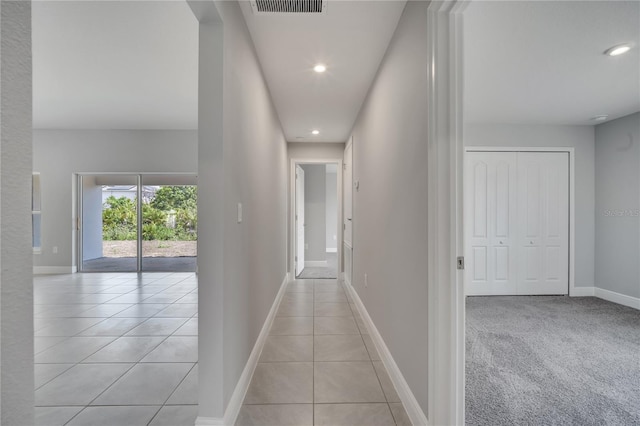 502 Viceroy Ct, Kissimmee, FL 34758 - hallway featuring recessed lighting, baseboards, and light tile patterned flooring