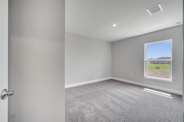 502 Viceroy Ct, Kissimmee, FL 34758 - carpeted spare room with baseboards and recessed lighting
