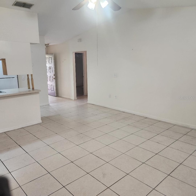 366-368 Dundee Dr, Kissimmee, FL 34759 - unfurnished living room with vaulted ceiling, a ceiling fan, baseboards, and light tile patterned flooring