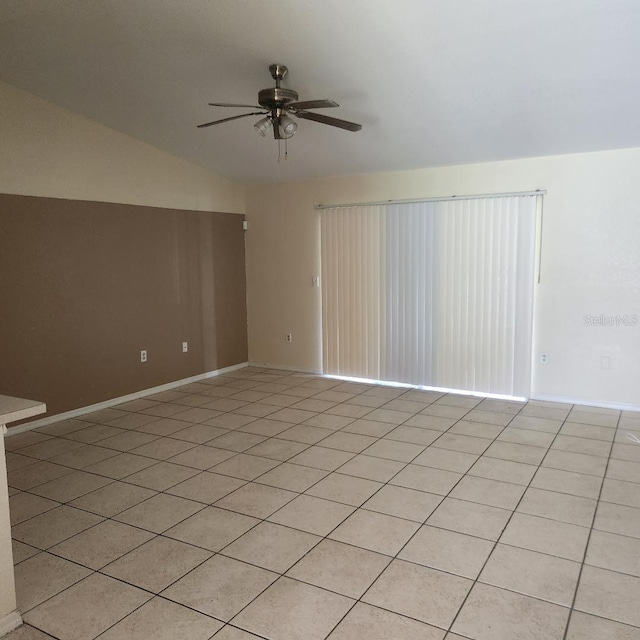366-368 Dundee Dr, Kissimmee, FL 34759 - unfurnished room featuring ceiling fan, lofted ceiling, baseboards, and light tile patterned floors