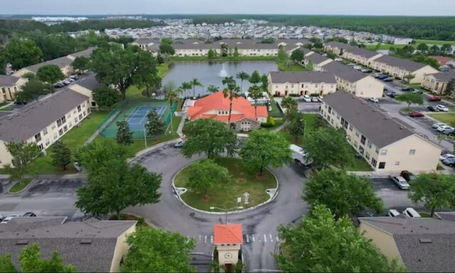 2798 Club Cortile Cir Unit A, Kissimmee, FL 34746 - aerial view of property and surrounding area with nearby suburban area and a large body of water