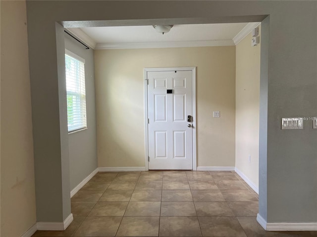 3003 Cobham Rd, Kissimmee, FL 34758 - tiled entryway with crown molding and baseboards
