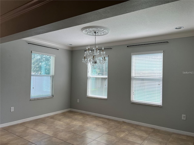 3003 Cobham Rd, Kissimmee, FL 34758 - empty room featuring a textured ceiling, crown molding, a chandelier, light tile patterned floors, and baseboards
