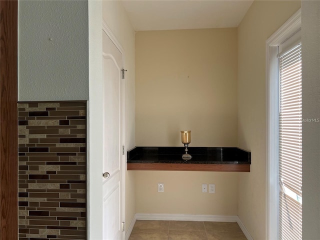 3003 Cobham Rd, Kissimmee, FL 34758 - washroom featuring light tile patterned floors and baseboards