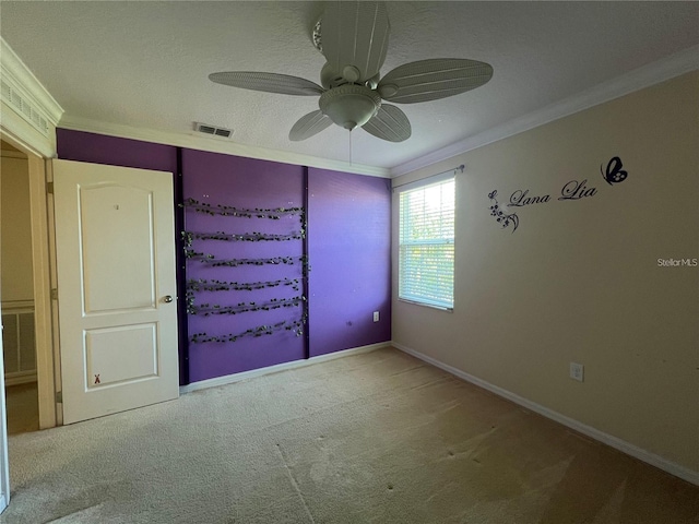 3003 Cobham Rd, Kissimmee, FL 34758 - carpeted empty room with ornamental molding, ceiling fan, and baseboards