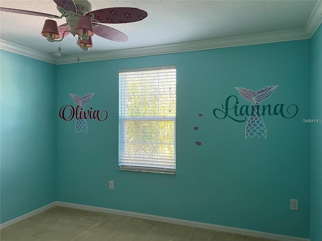 3003 Cobham Rd, Kissimmee, FL 34758 - spare room with crown molding, a ceiling fan, a textured ceiling, and baseboards