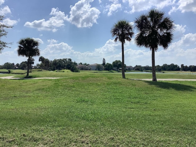 88 Club Villas Ln, Kissimmee, FL 34744 - view of property's community with a lawn