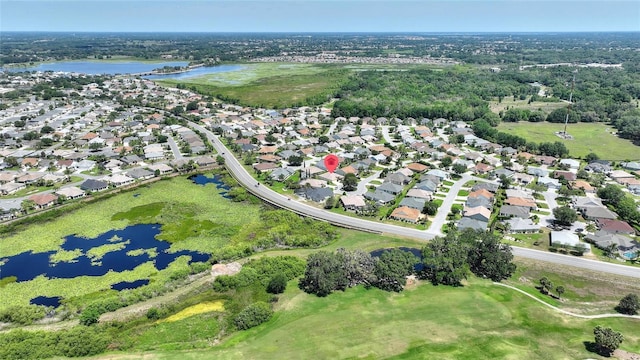 1258 Donalds Pl, The Villages, FL 32162 - aerial view of property and surrounding area with a large body of water, nearby suburban area, and a local golf course
