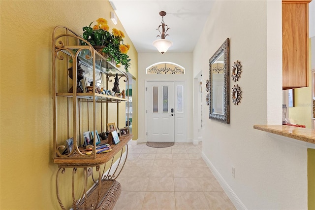 1258 Donalds Pl, The Villages, FL 32162 - entrance foyer featuring light tile patterned flooring and baseboards