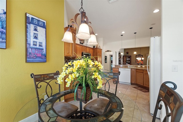1258 Donalds Pl, The Villages, FL 32162 - dining room with light tile patterned floors and recessed lighting