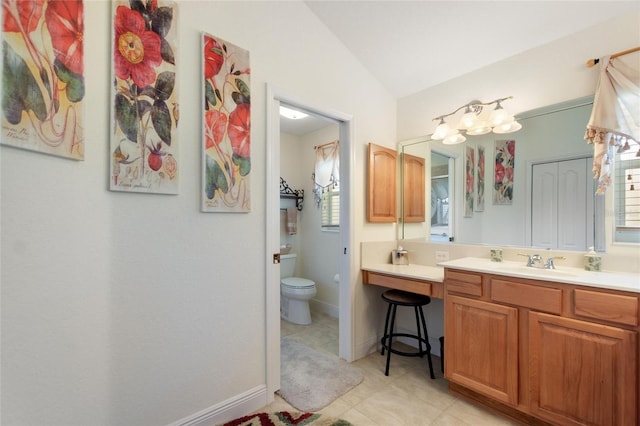 1258 Donalds Pl, The Villages, FL 32162 - full bath featuring vaulted ceiling, vanity, toilet, tile patterned flooring, and baseboards