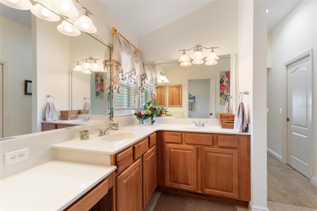 1258 Donalds Pl, The Villages, FL 32162 - full bathroom featuring vaulted ceiling, a chandelier, and double vanity