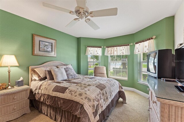1258 Donalds Pl, The Villages, FL 32162 - bedroom with carpet, baseboards, and a ceiling fan
