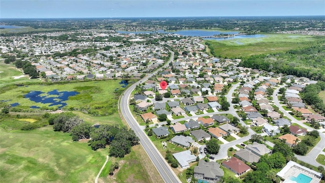 1258 Donalds Pl, The Villages, FL 32162 - view of property location with a large body of water, nearby suburban area, and a local golf course
