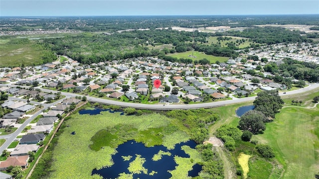 1258 Donalds Pl, The Villages, FL 32162 - aerial overview of property's location featuring a large body of water, nearby suburban area, and a local golf course