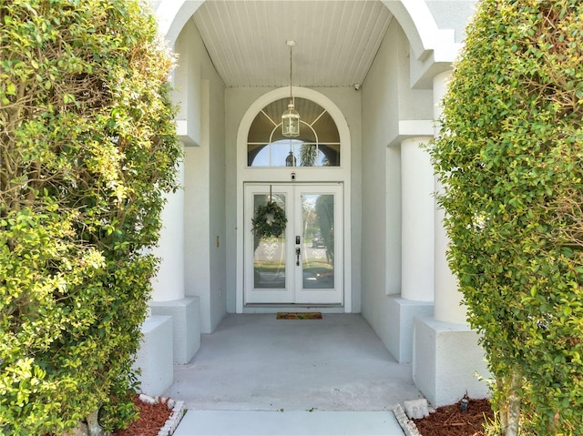 3211 Countryside View Dr, Saint Cloud, FL 34772 - property entrance with french doors and stucco siding