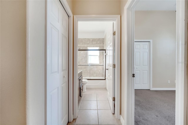 3211 Countryside View Dr, Saint Cloud, FL 34772 - hall featuring light tile patterned floors and baseboards