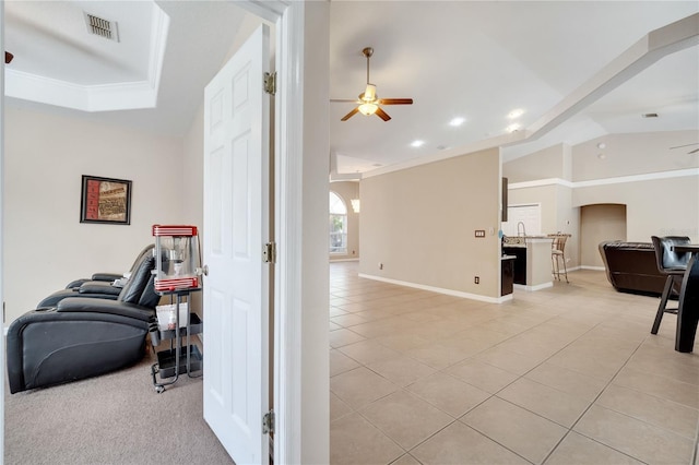 3211 Countryside View Dr, Saint Cloud, FL 34772 - living room featuring arched walkways, a ceiling fan, light tile patterned flooring, lofted ceiling, and baseboards