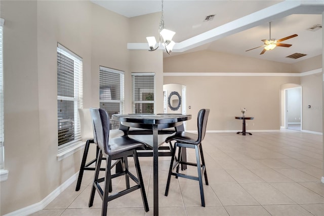 3211 Countryside View Dr, Saint Cloud, FL 34772 - dining area featuring arched walkways, light tile patterned flooring, vaulted ceiling, ceiling fan, and healthy amount of natural light