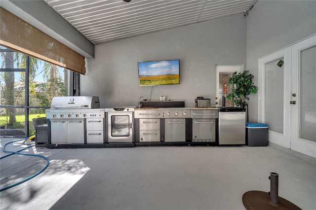 3211 Countryside View Dr, Saint Cloud, FL 34772 - view of patio with exterior kitchen, a lanai, and grilling area