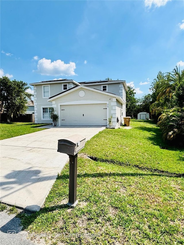 467 Martigues Dr, Kissimmee, FL 34759 - view of front of home featuring concrete driveway, a front lawn, an attached garage, and stucco siding